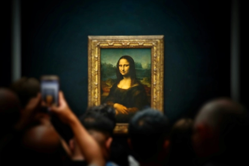 The Mona Lisa painting in the Louvre The Mona Lisa, painted by Leonardo da Vinci in the early 16th century, is one of the most famous and recognizable artworks in the world. Housed in the Louvre Museum in Paris, this masterpiece is celebrated for its mysterious smile, subtle use of light and shadow, and masterful technique known as sfumato.