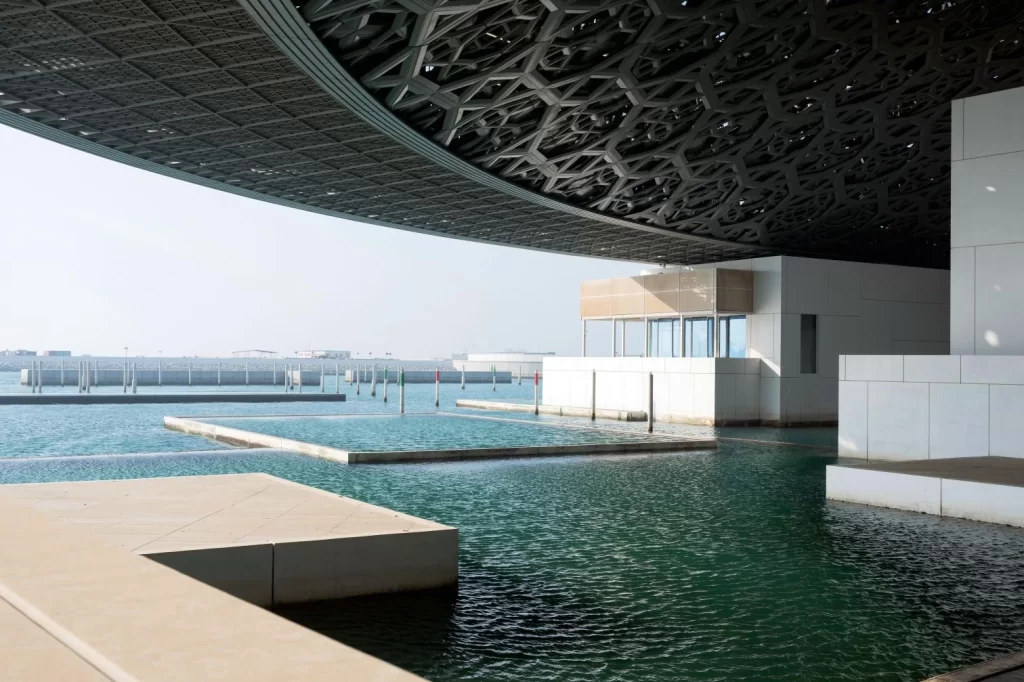 The Louvre Abu Dhabi is a cultural landmark established through a 30-year agreement with France, allowing it to display works from the famous Parisian museum.