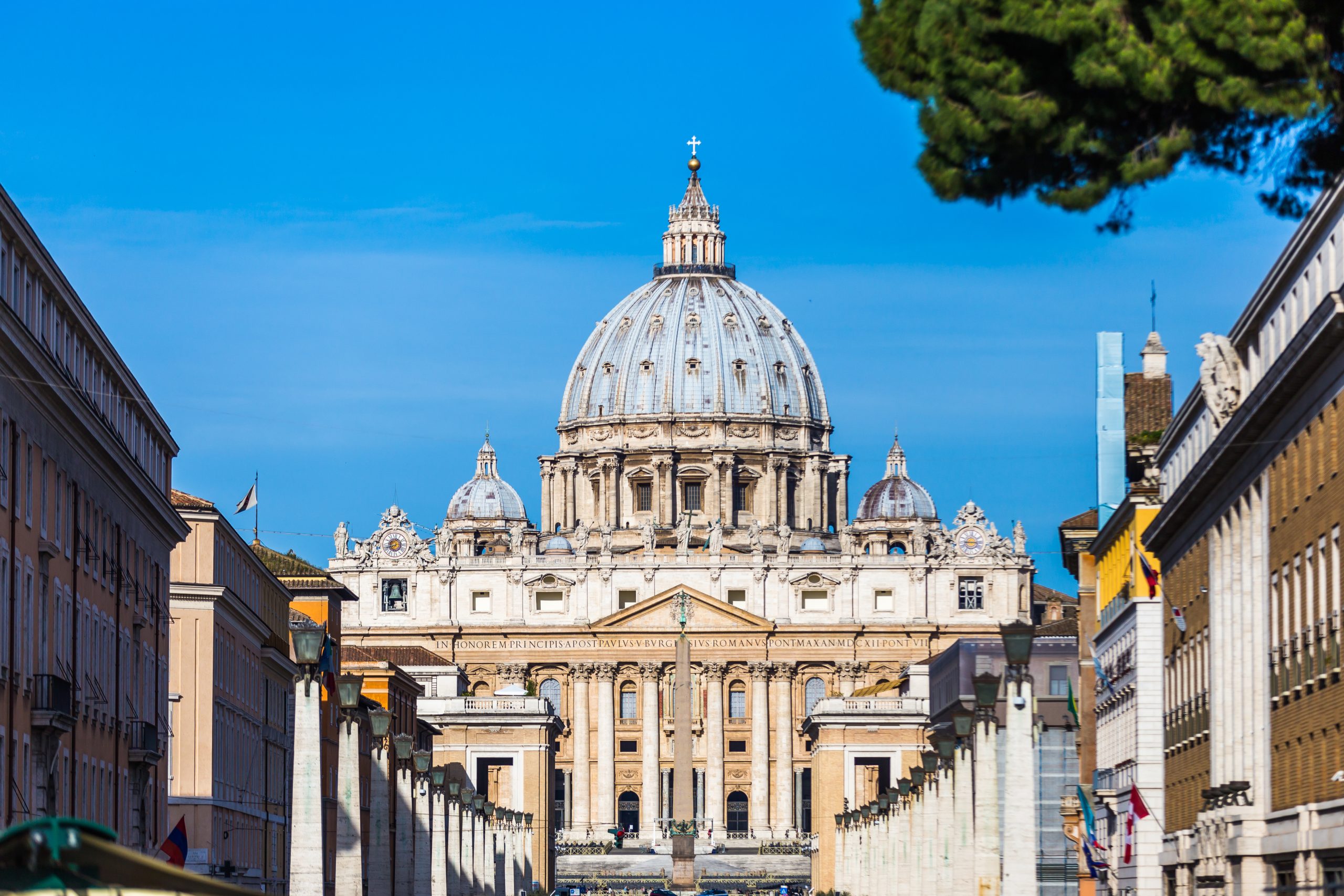 Tourism and sightseeing, view over famous St. Peter's Basilica, Vatican City.